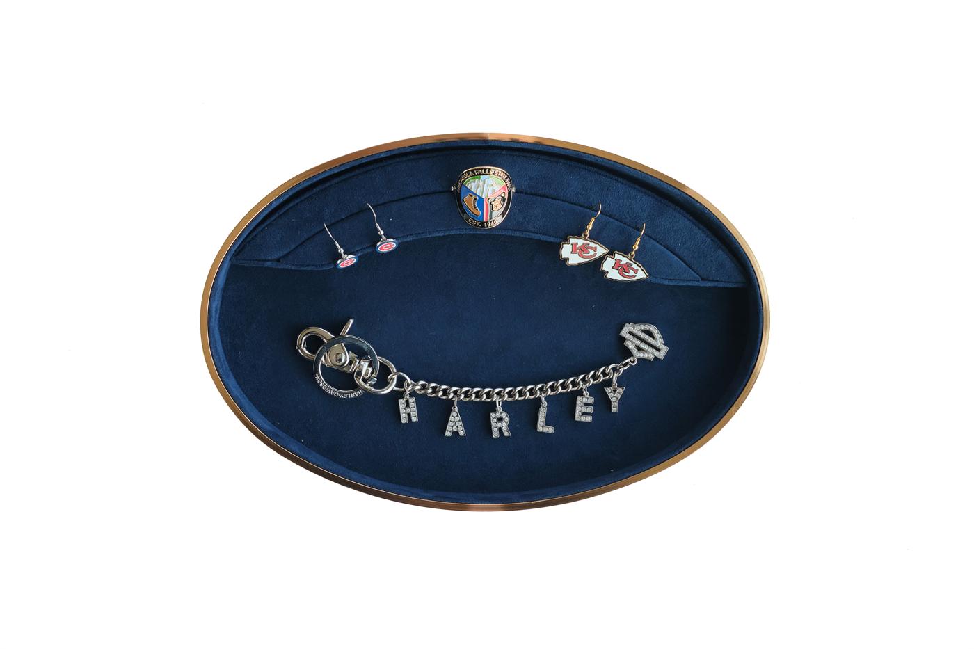 Selected corporate merchandise including branded jewelry and gifting items